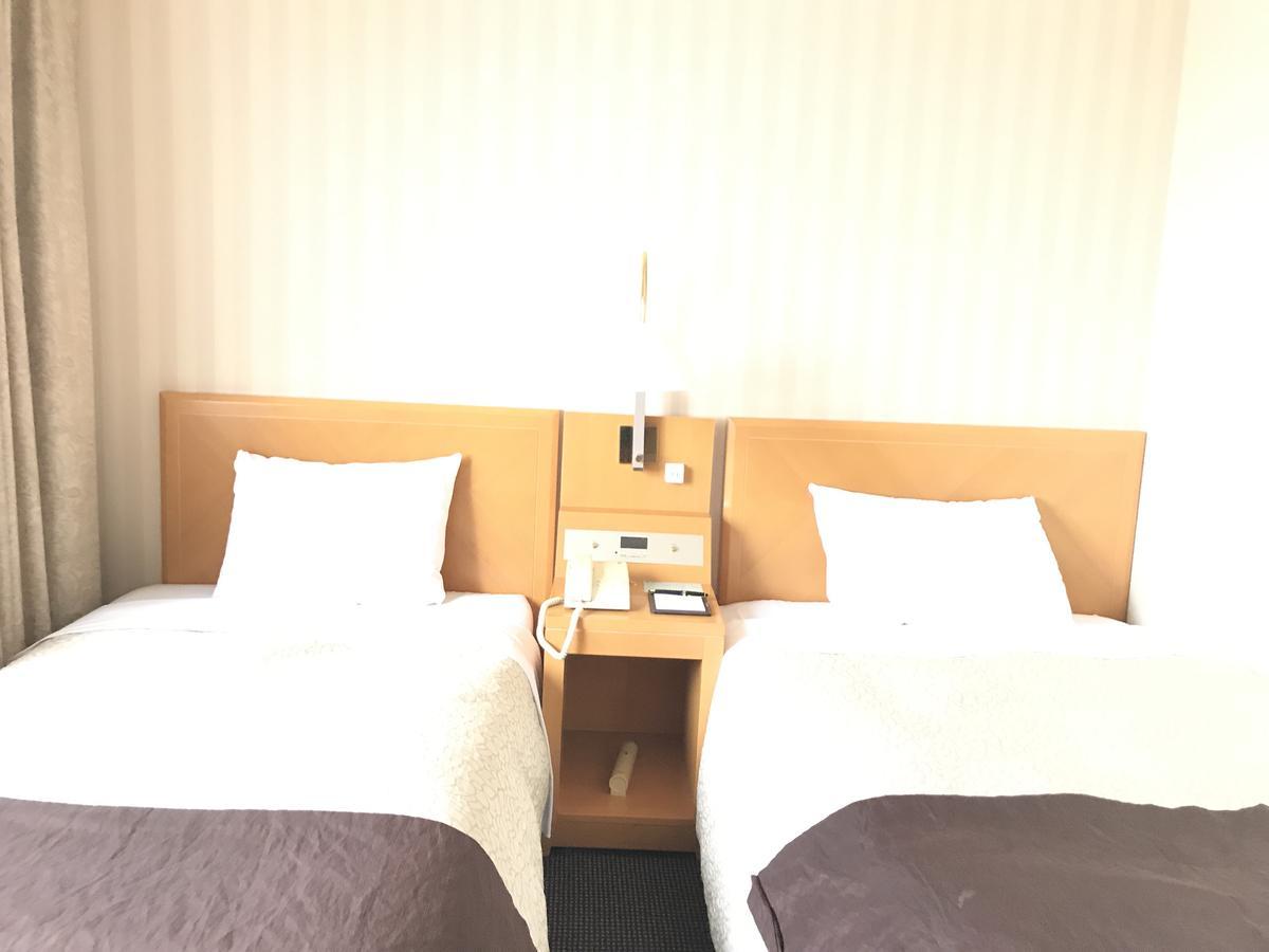 Numazu River Side Hotel Esterno foto